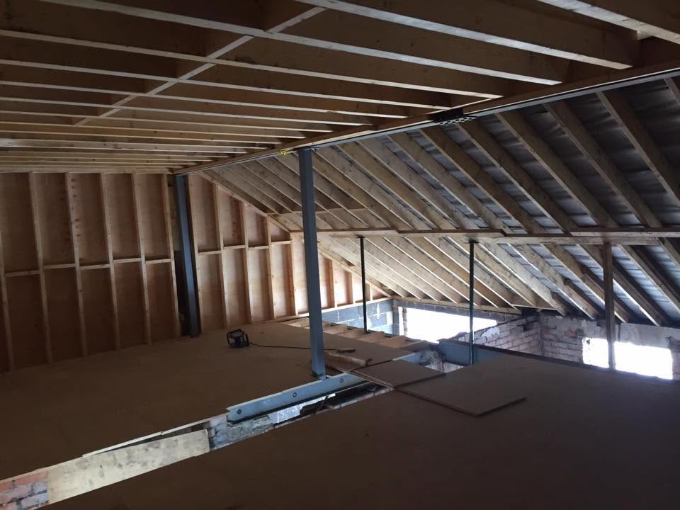 Loft conversion mid-build with new structural carpentry by RG